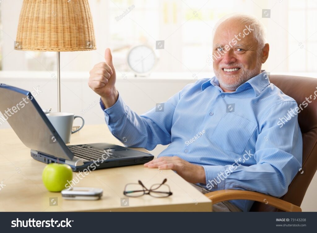 Happy man giving thumbs up